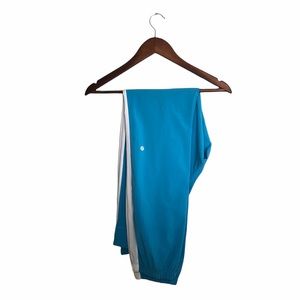 LULULEMON baby blue with white straps and pockets pants women size 8